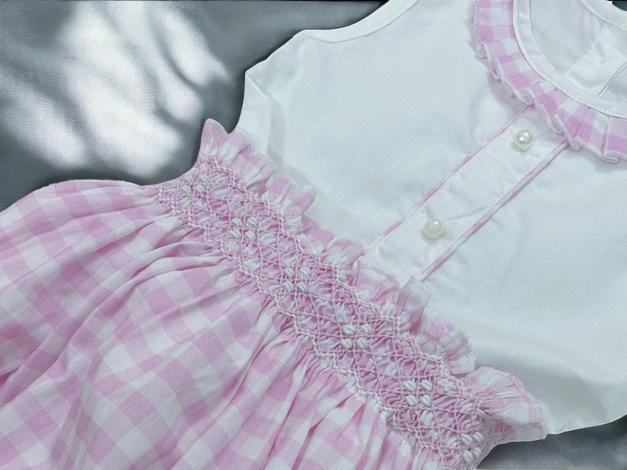 Girls pink and white checkered romper with smocked waistband