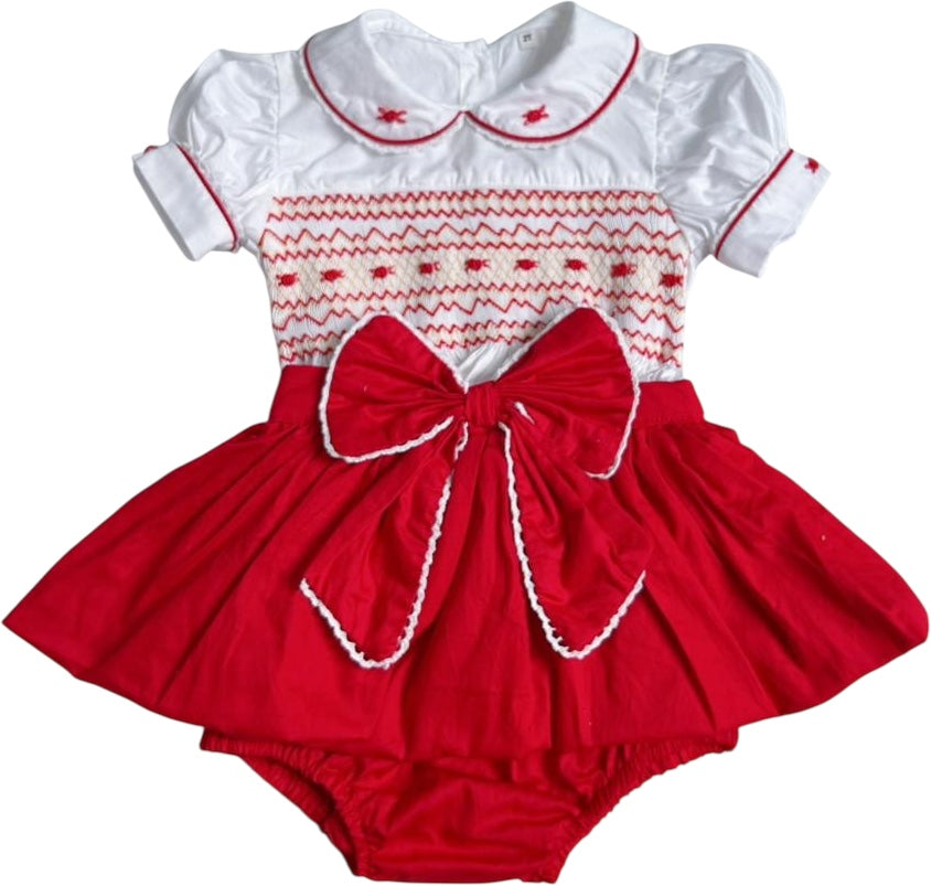 Red smocked skirt romper