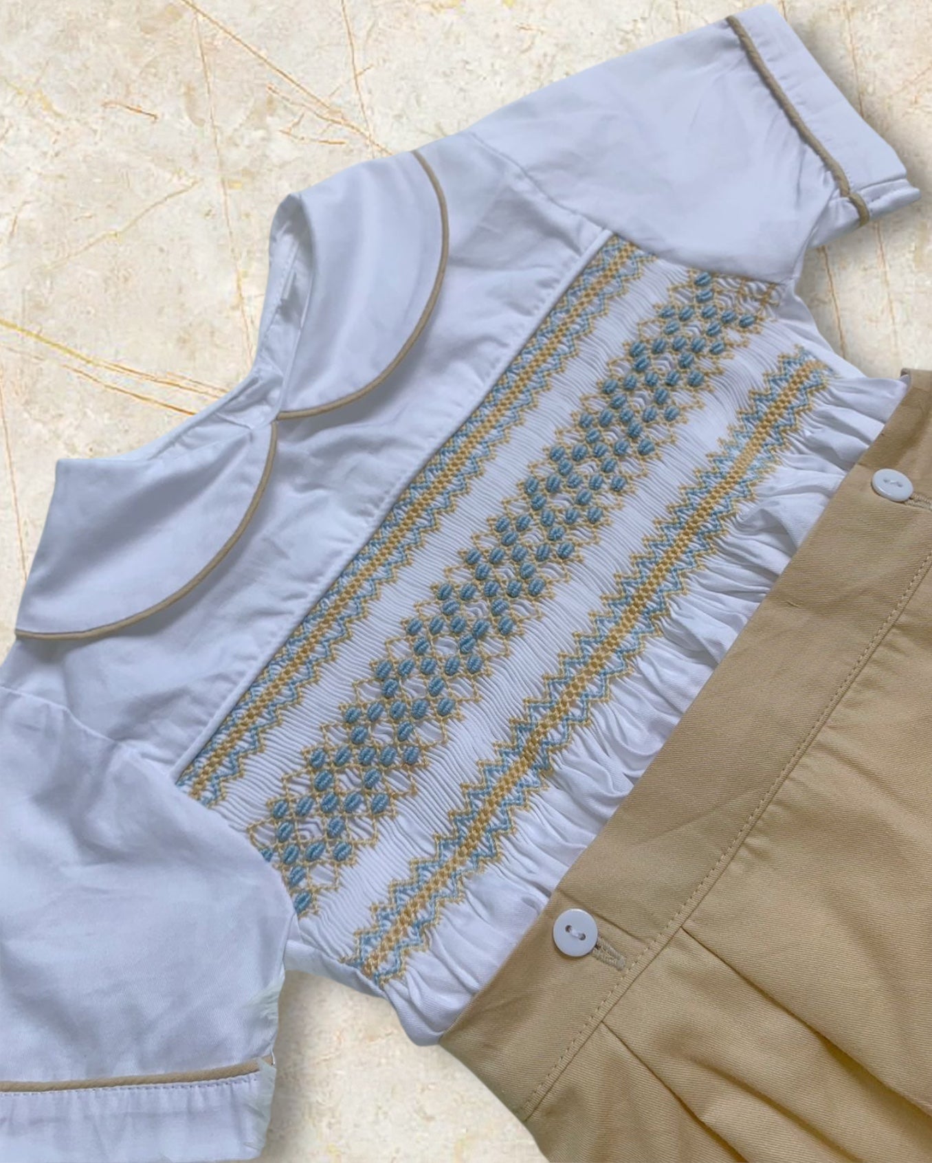 Tan with pastel blue smocking boys suit