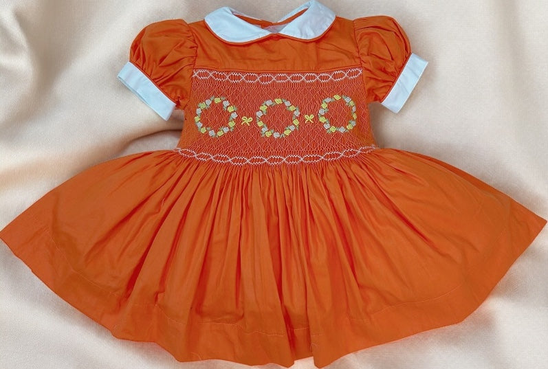 Orange smocked dress