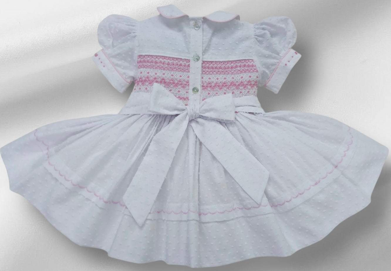 White Smocked back and front Swiss dot with pink