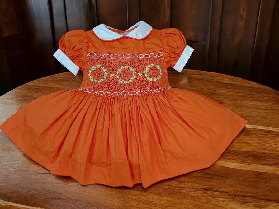 Orange smocked dress
