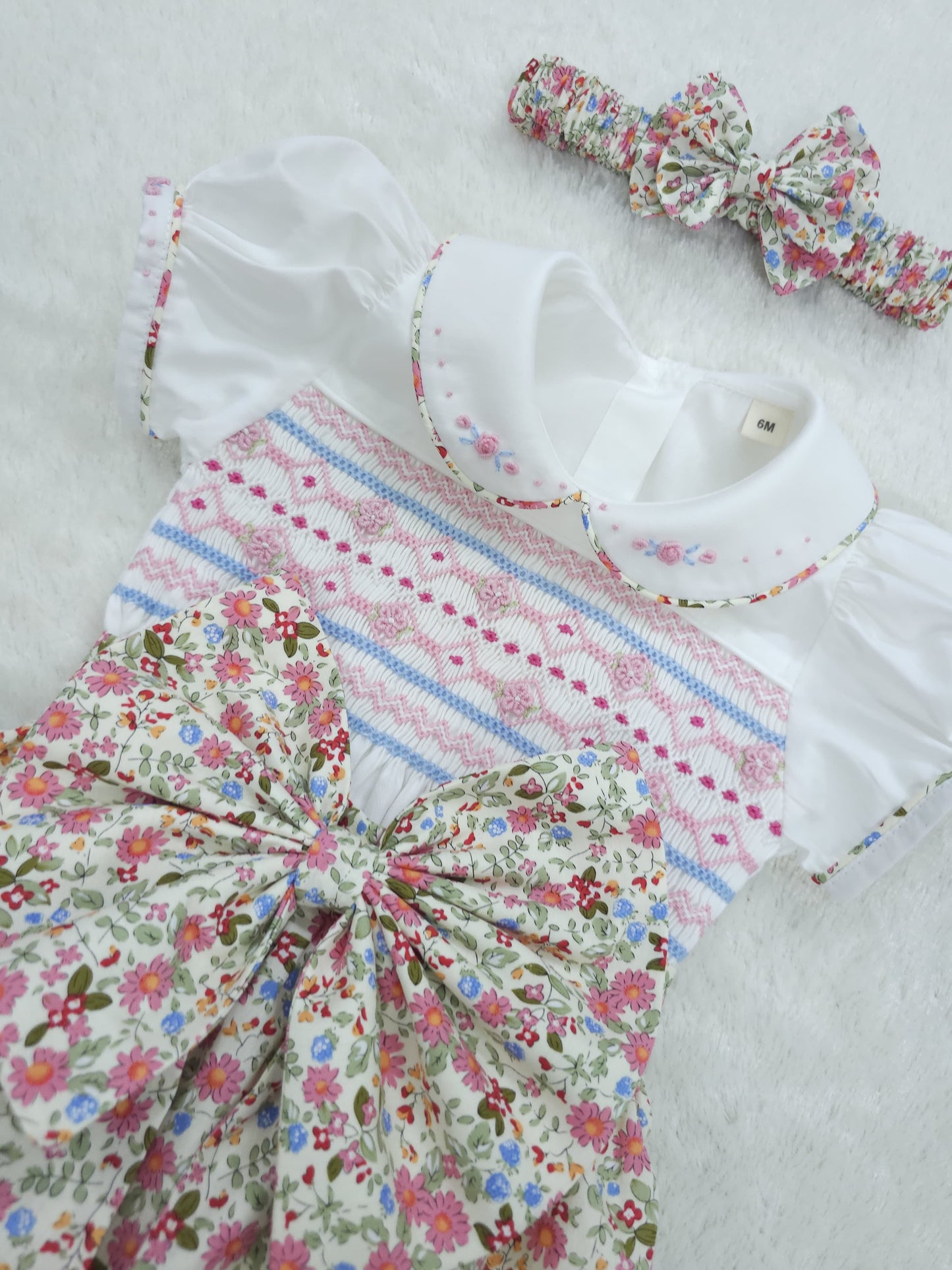 Pink and Blue ditsy hand smocked girls romper