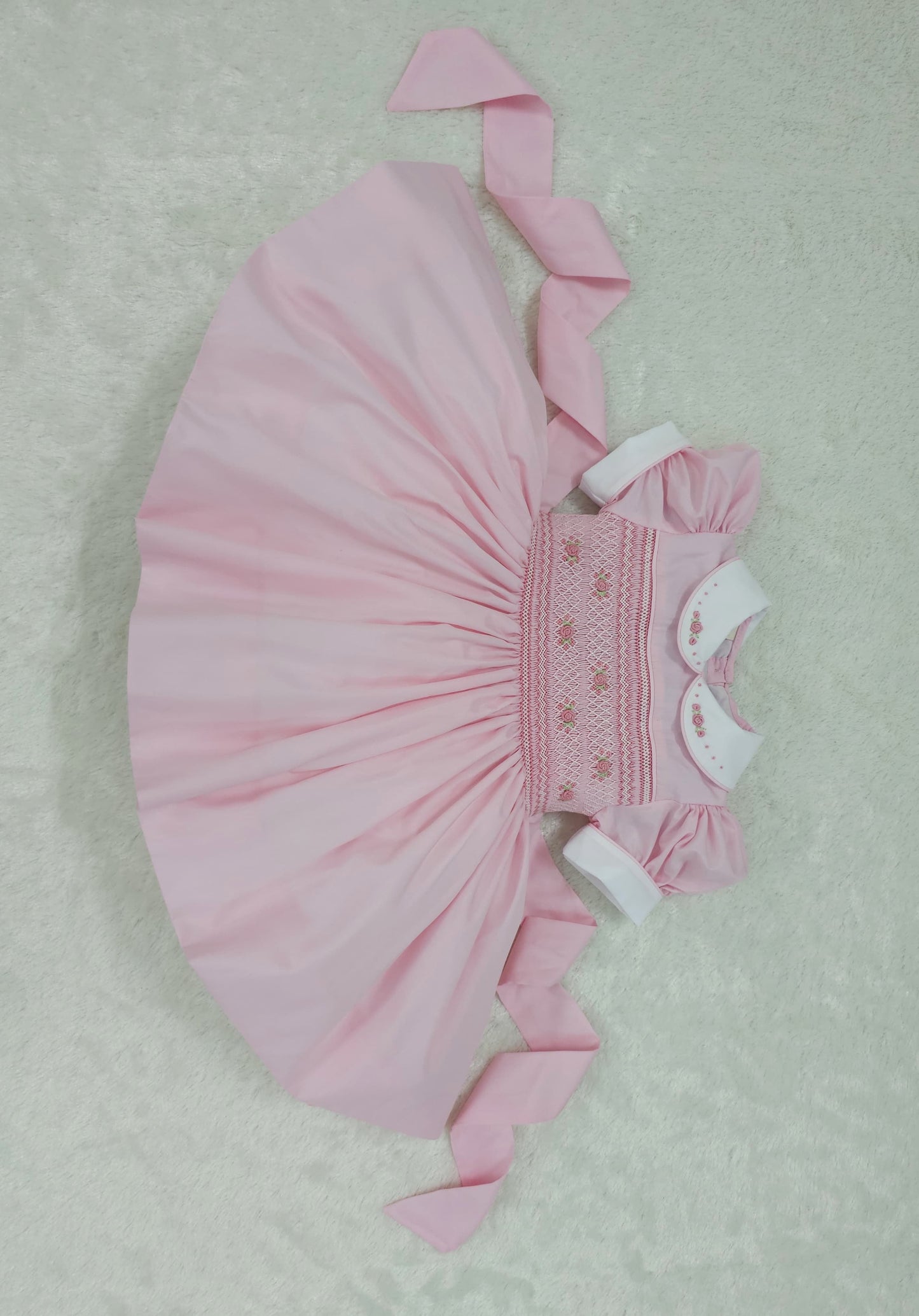 Pink smocked back and front