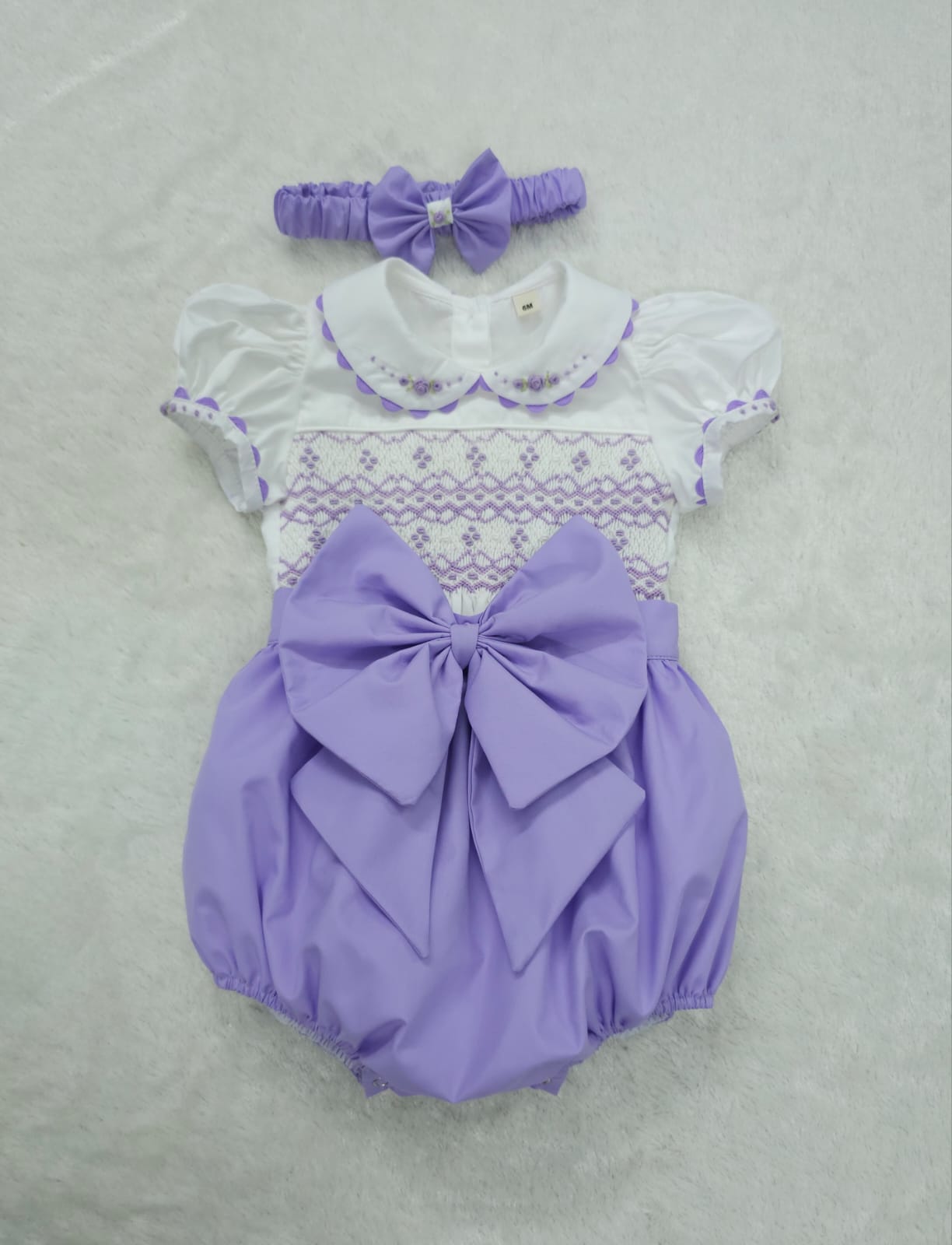Lilac smocked romper