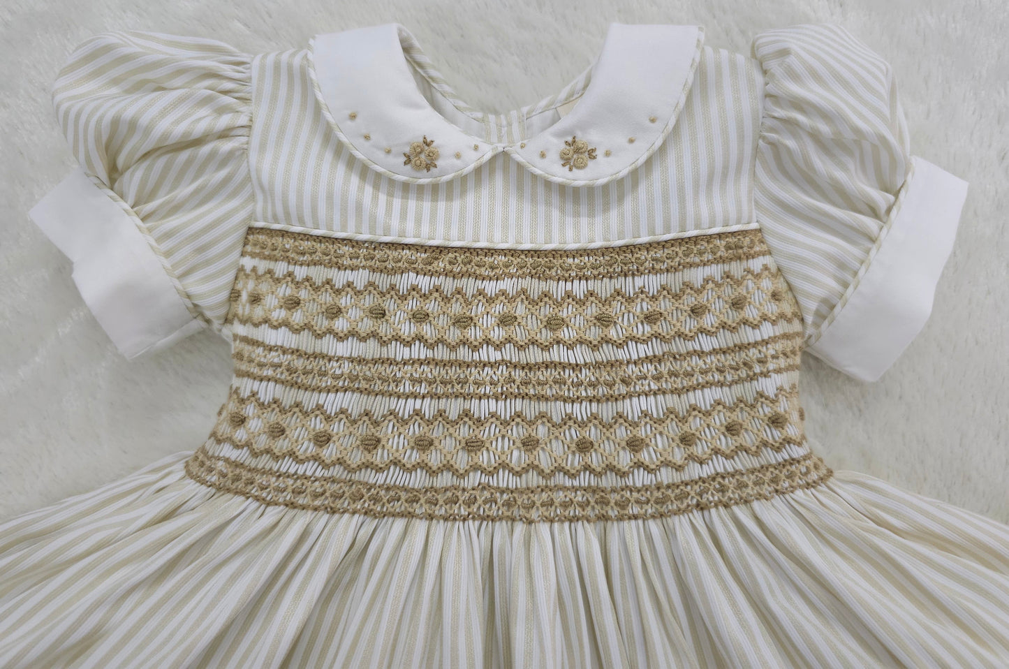 Gold and white striped dress with tan smocking ( got matching boys suit available )