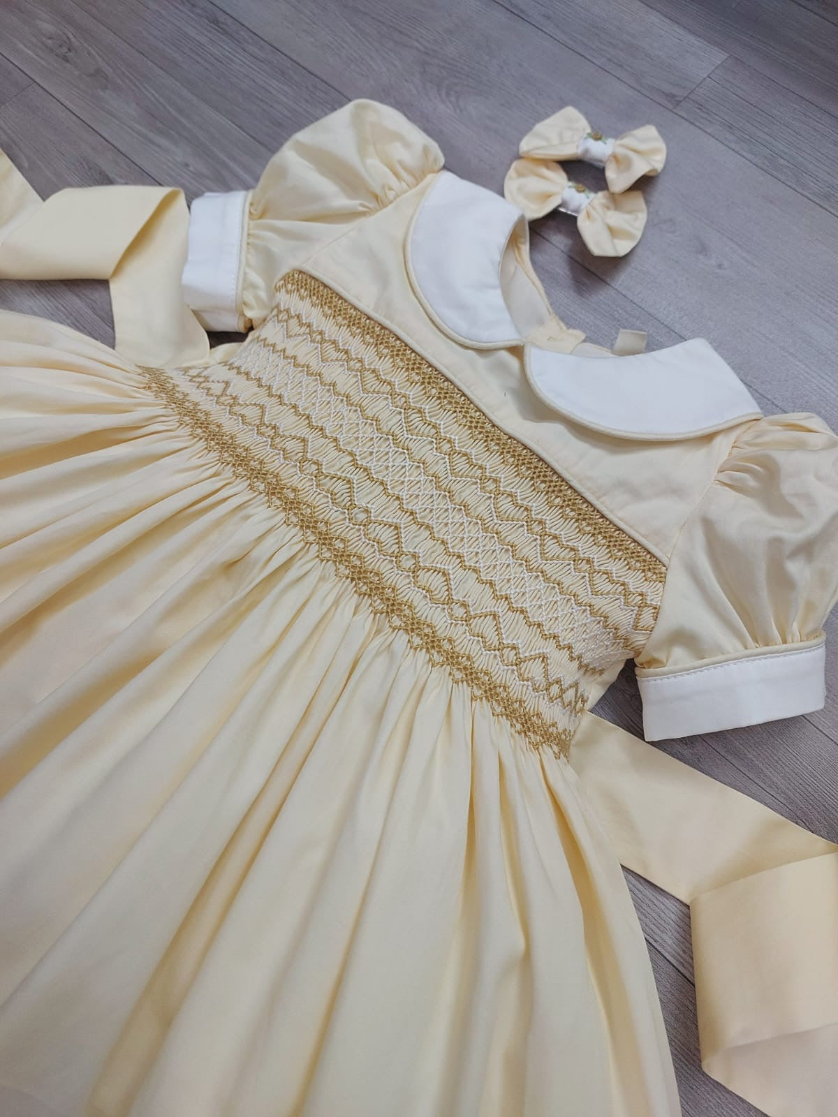 Cream and tan smocked dress