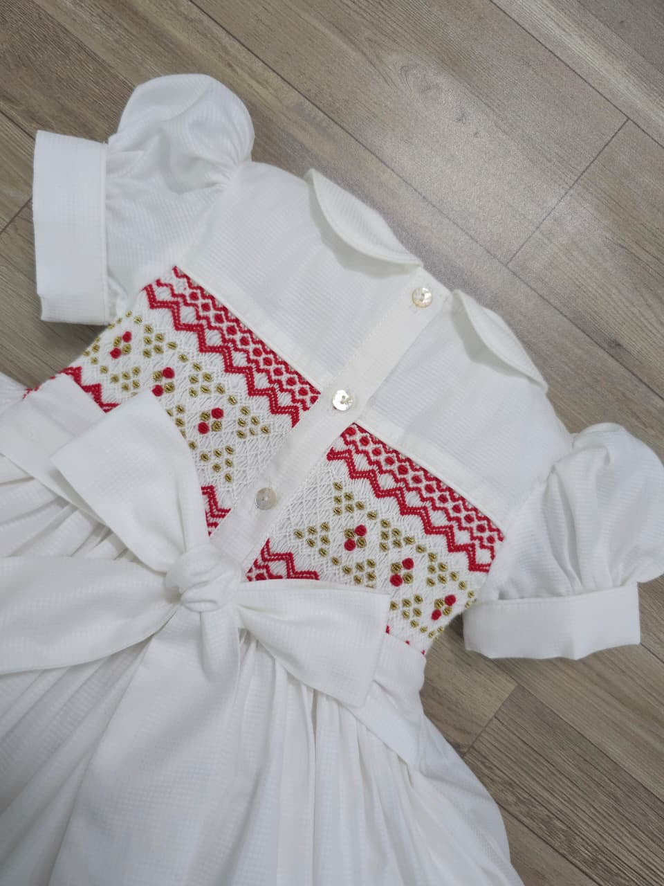 White smocked back and front with red and gold ( for matching boys suit ) PRE ORDER HERE IN 2-3 WEEKS