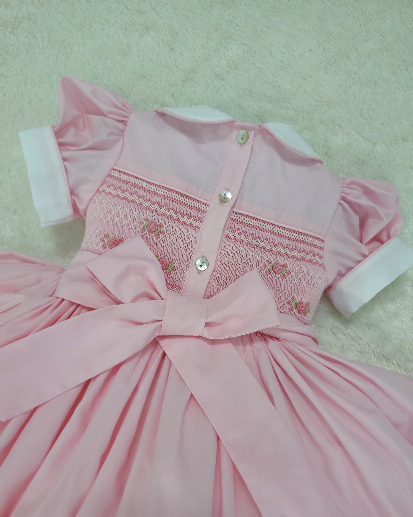 Pink smocked back and front