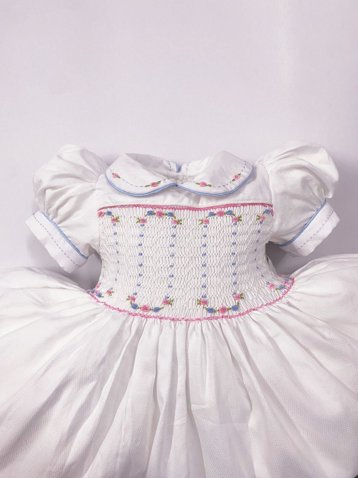 Luxe White smocked back and front