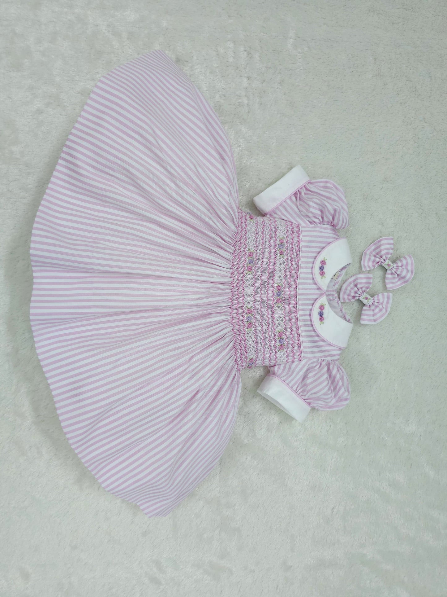 Pink and white stripe with pink and lilac smocking