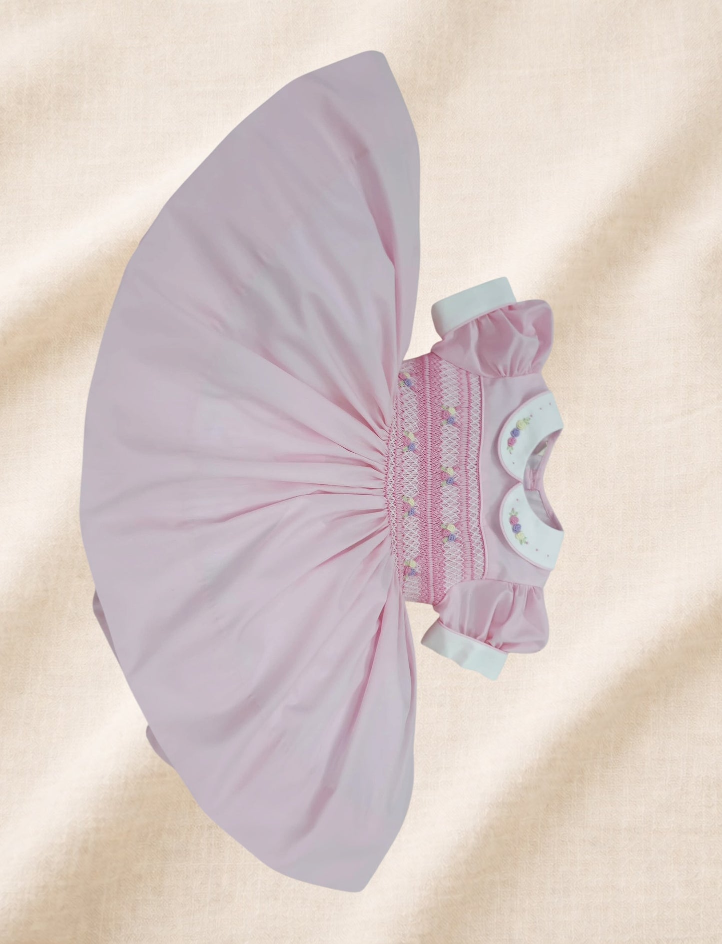 Pink and pastel hand smocked back and front dress