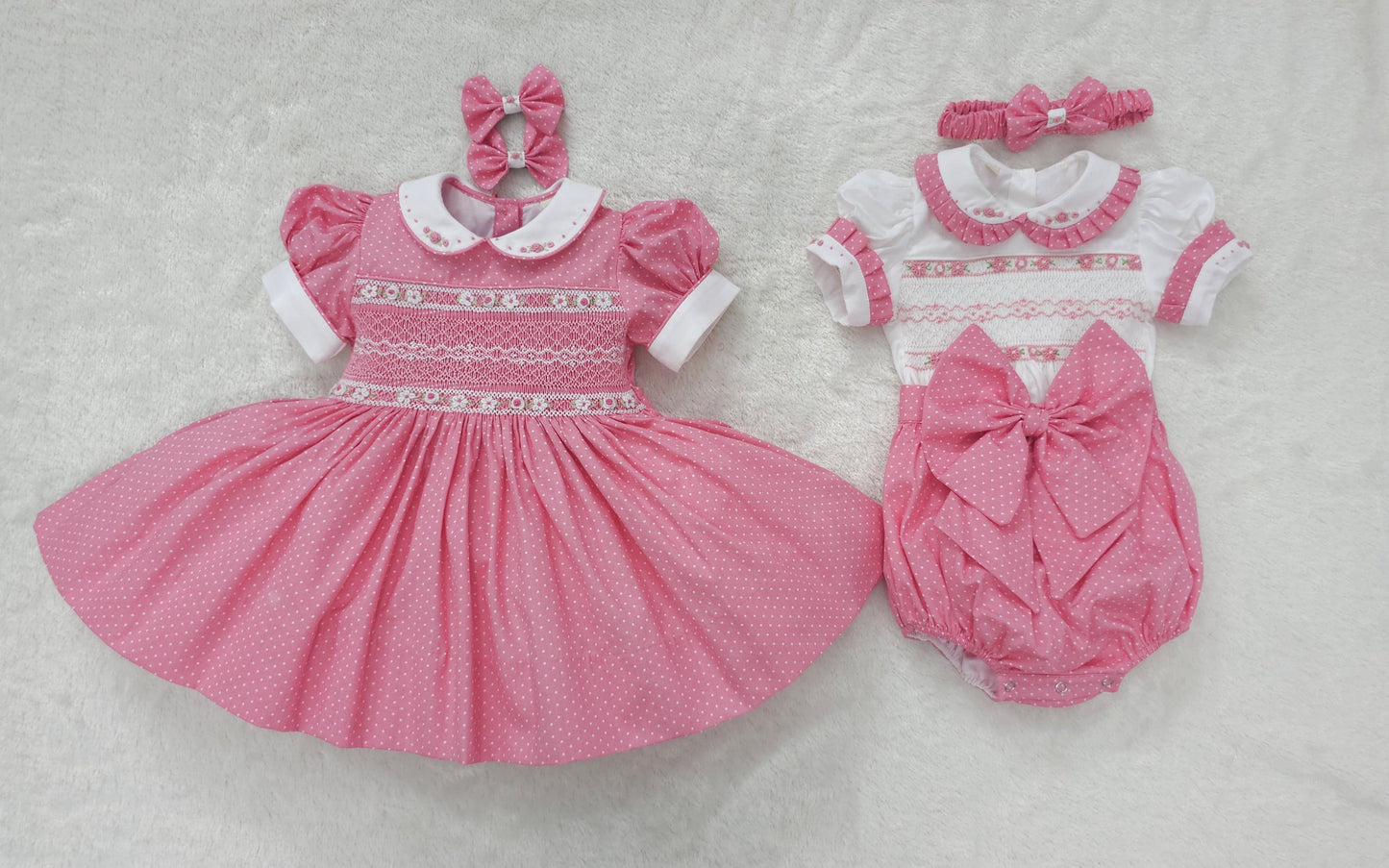Pink polkadot with white smocking and embroidery ( got matching romper available )