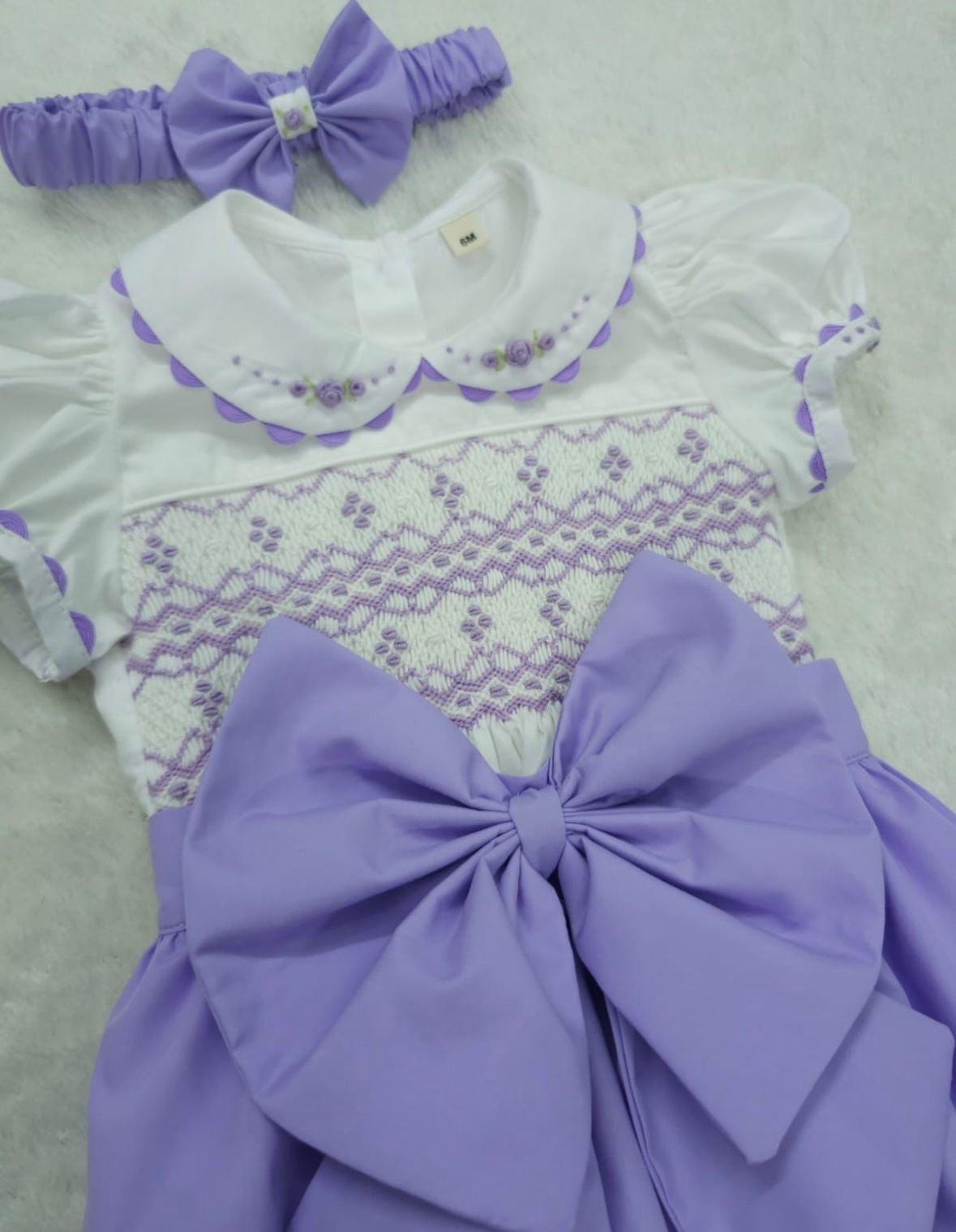 Lilac smocked romper