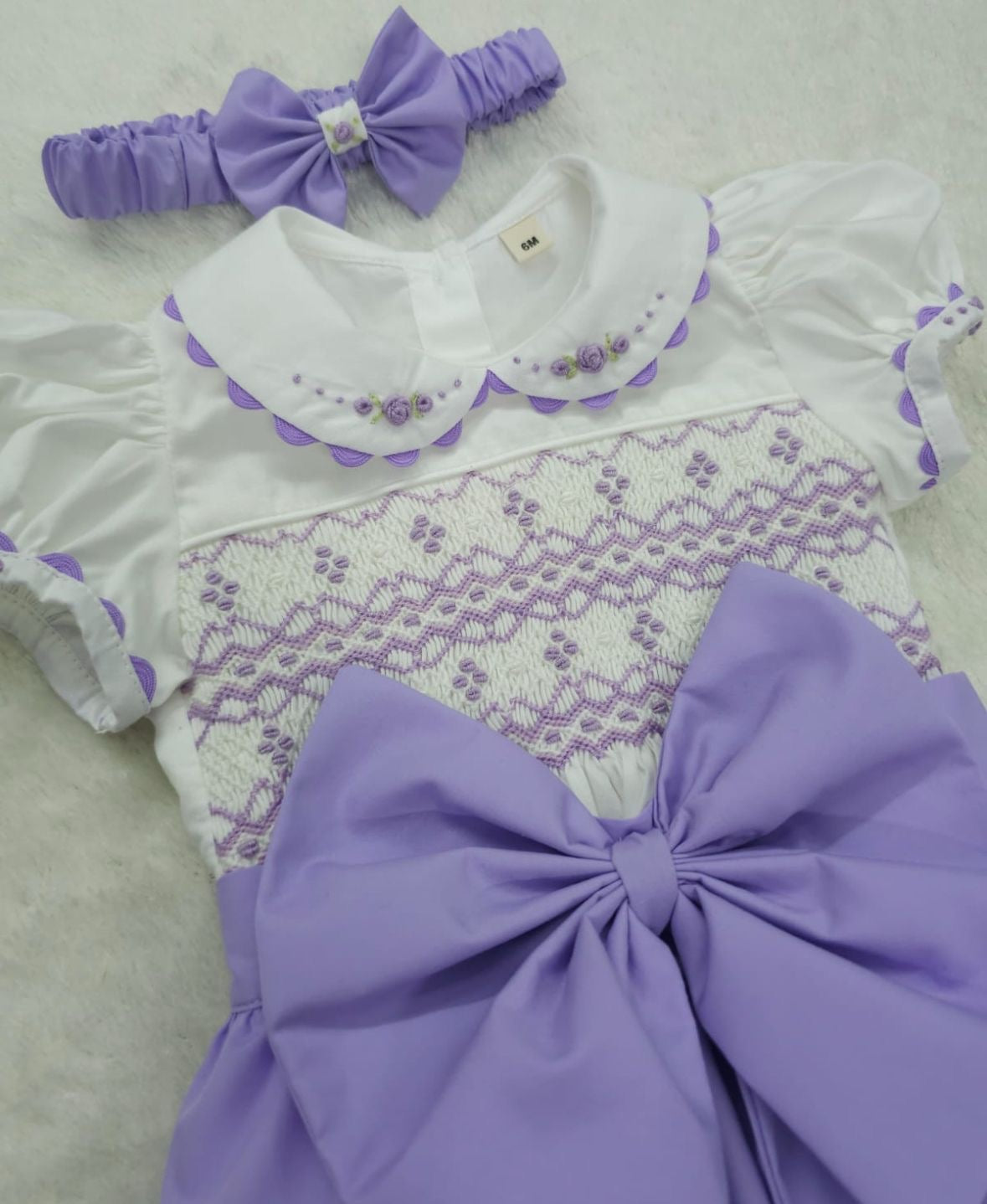 Lilac smocked romper