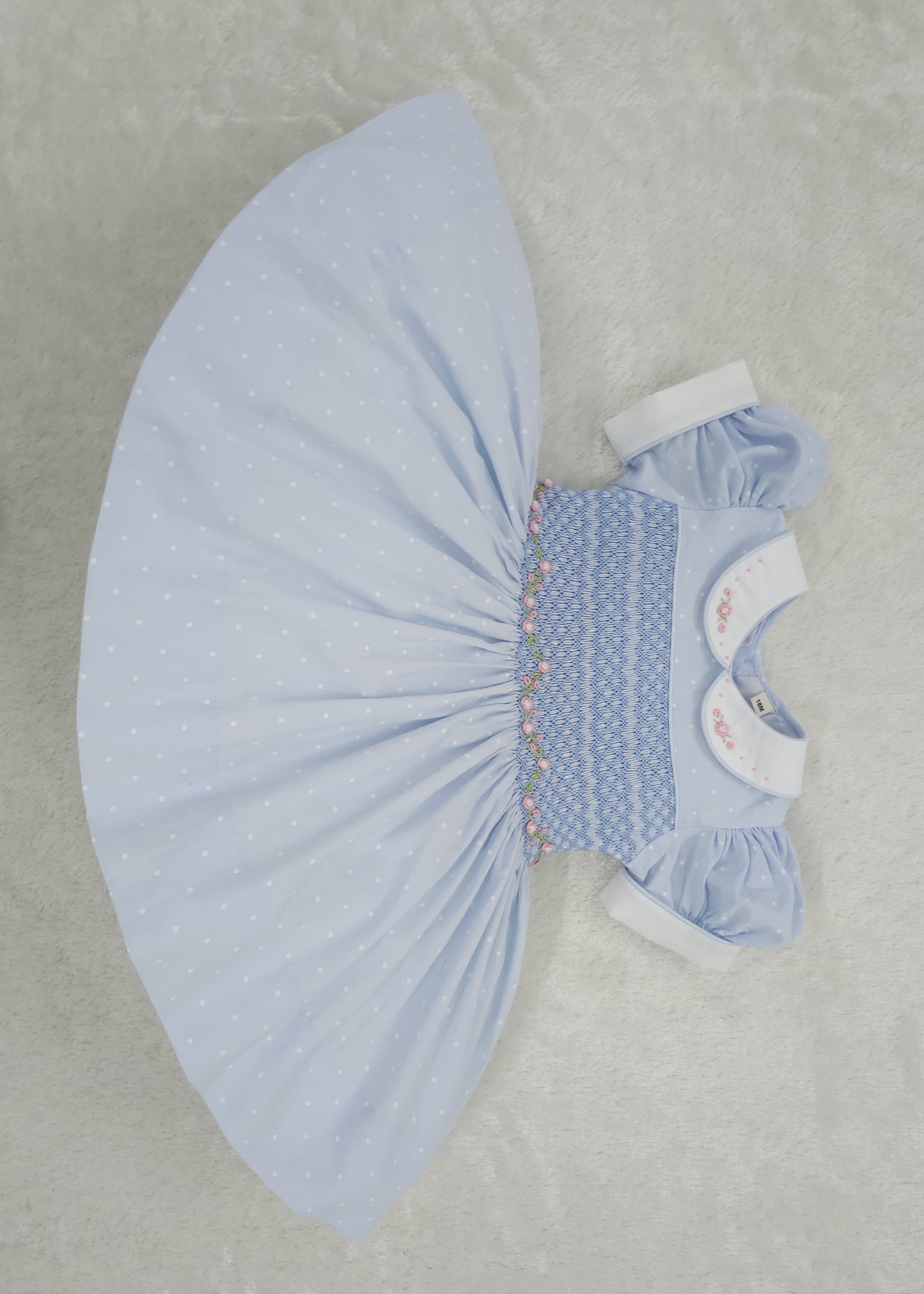 Blue polkadot smocked dress