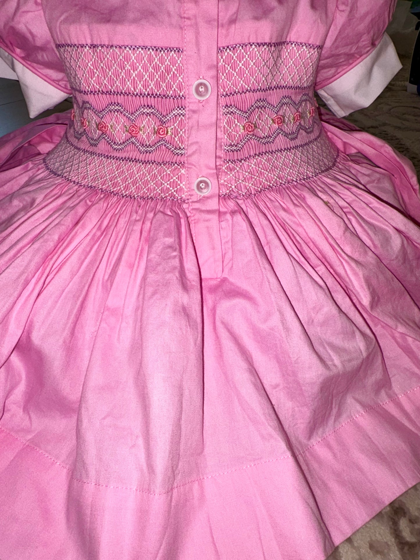 Pink with lilac smocked back and front