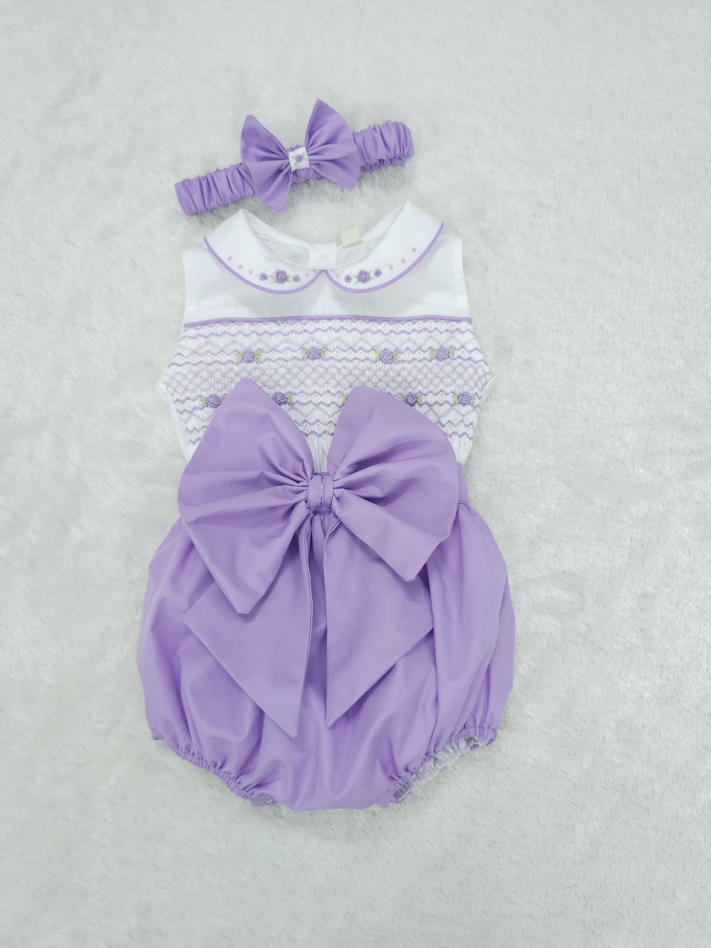 Lilac sleeveless smocked romper