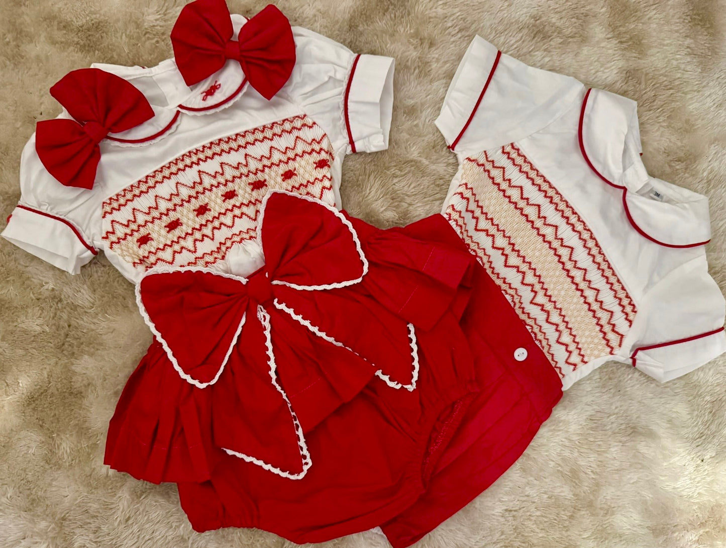 Red smocked skirt romper