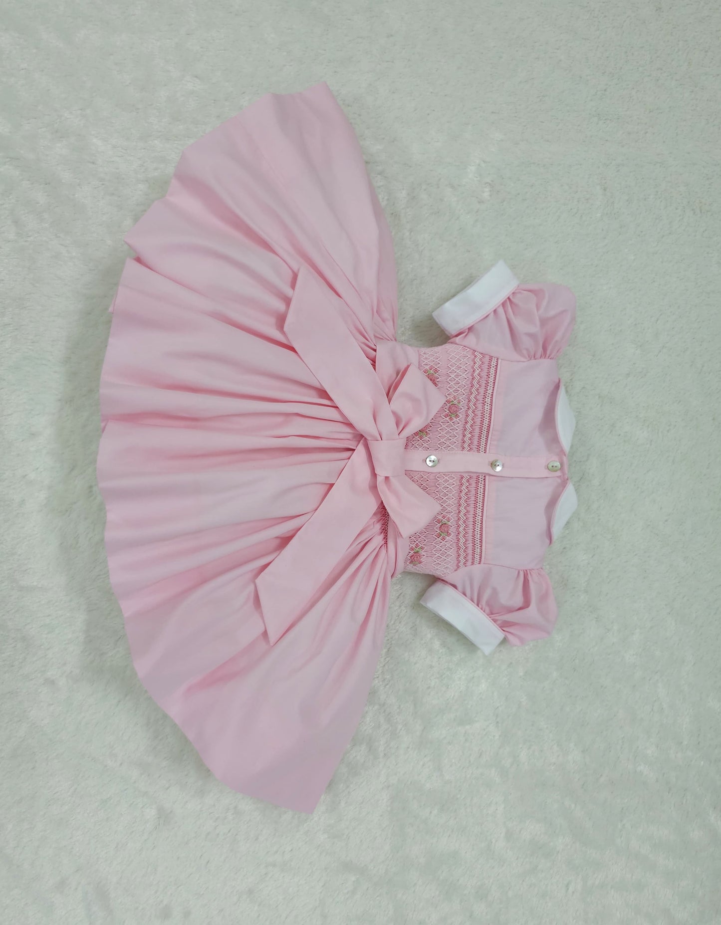 Pink smocked back and front
