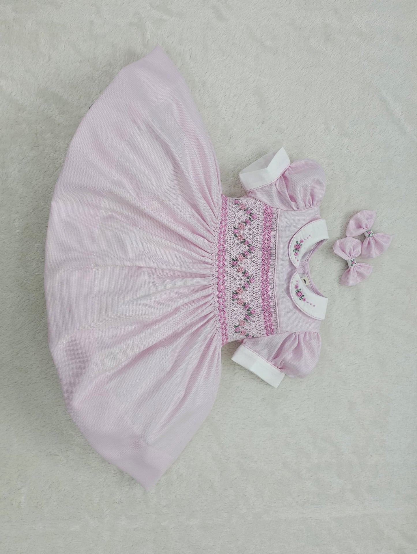 Pink smocked dress