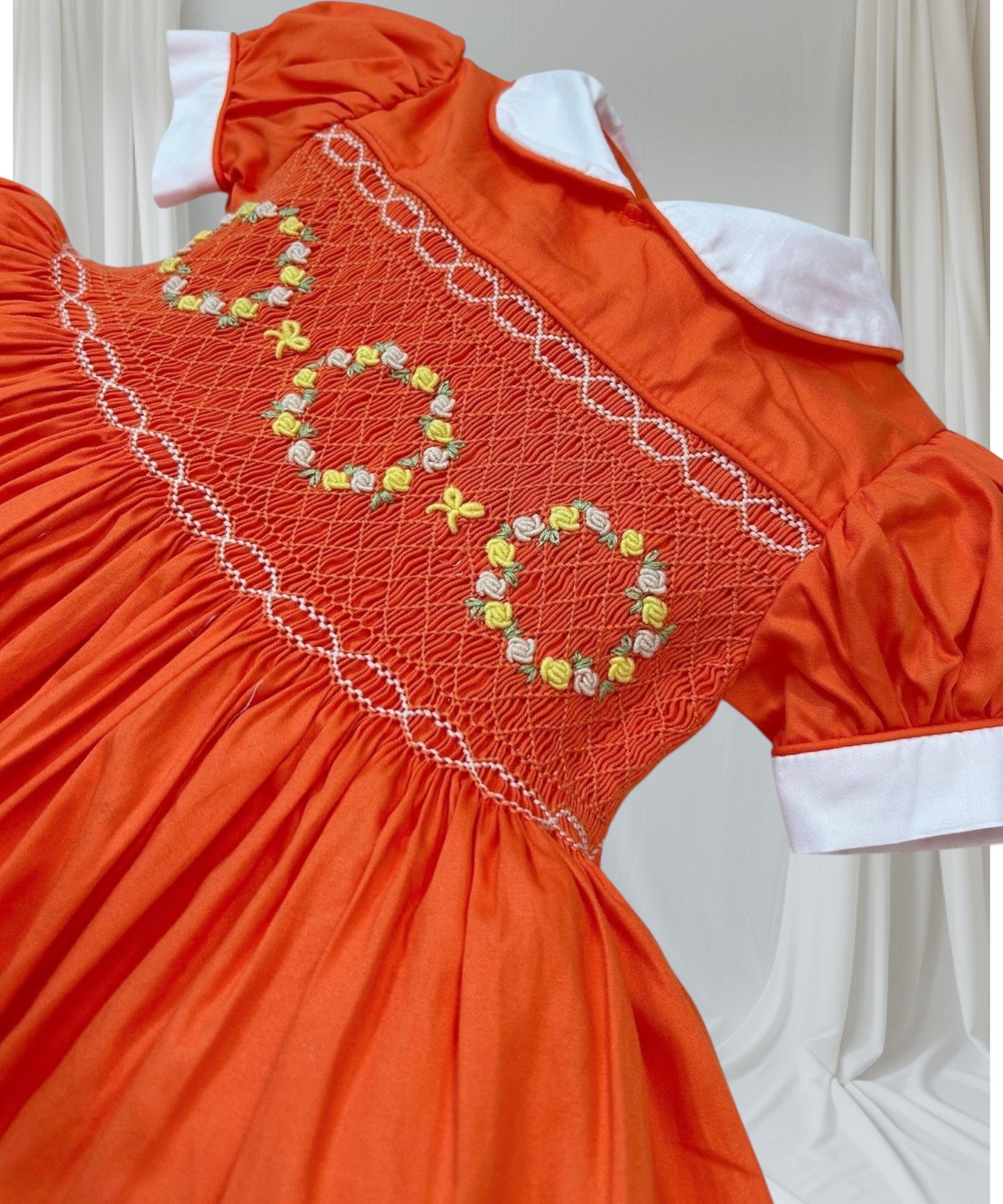 Orange smocked dress