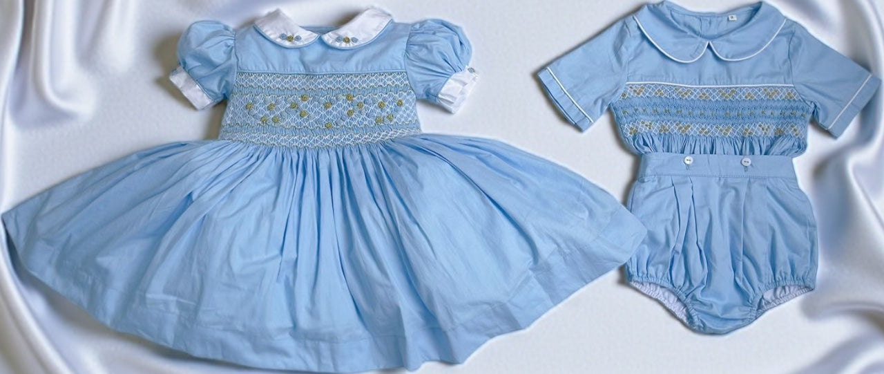Blue with hearts smocked dresses ( got matching boys suit available )