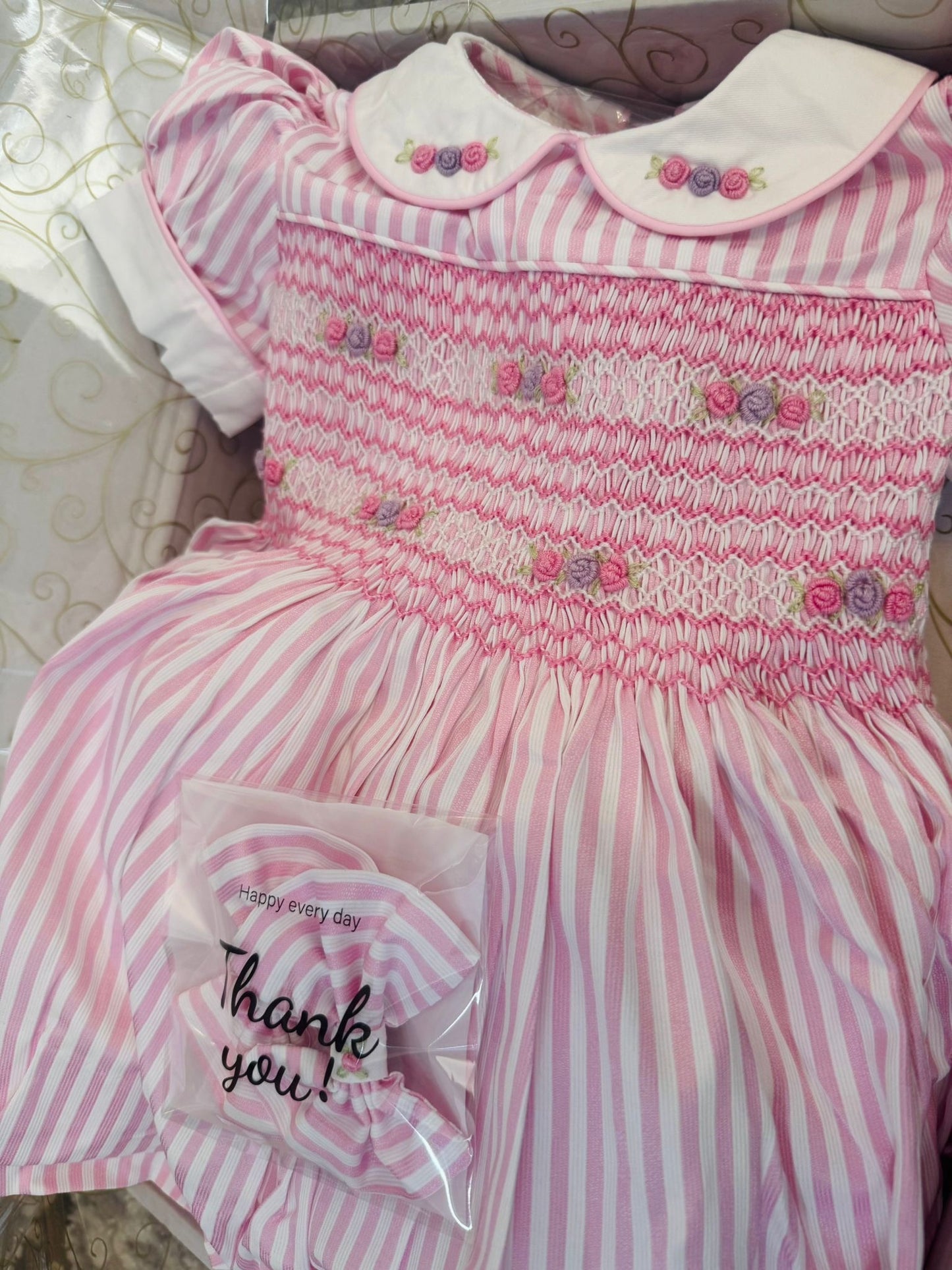 Pink and white stripe with pink and lilac smocking