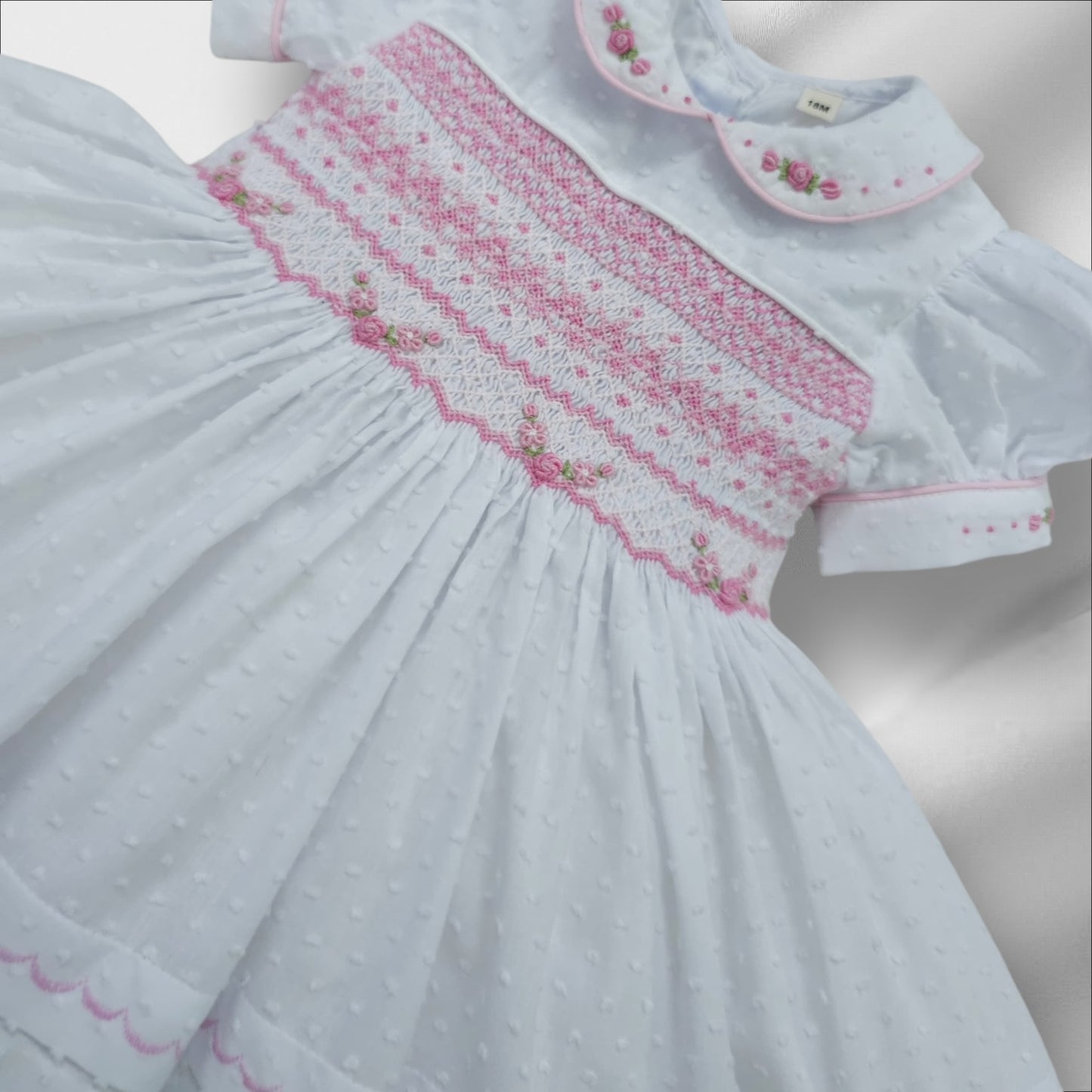 White Smocked back and front Swiss dot with pink