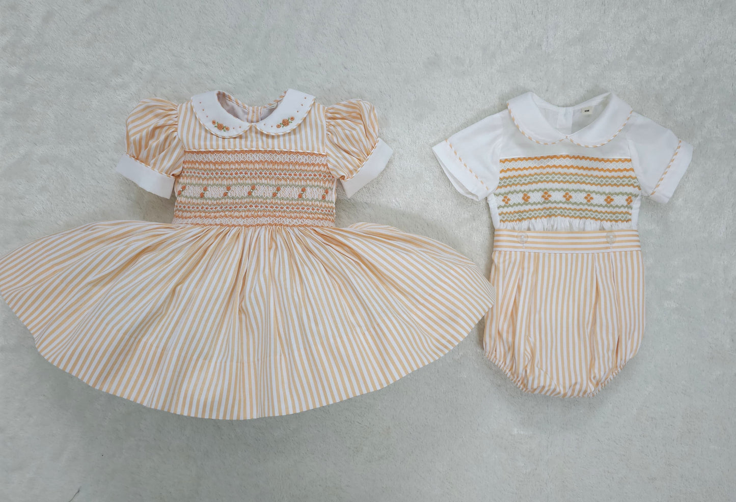Orange/peach stripe smocked dress ( got matching boys suit available )