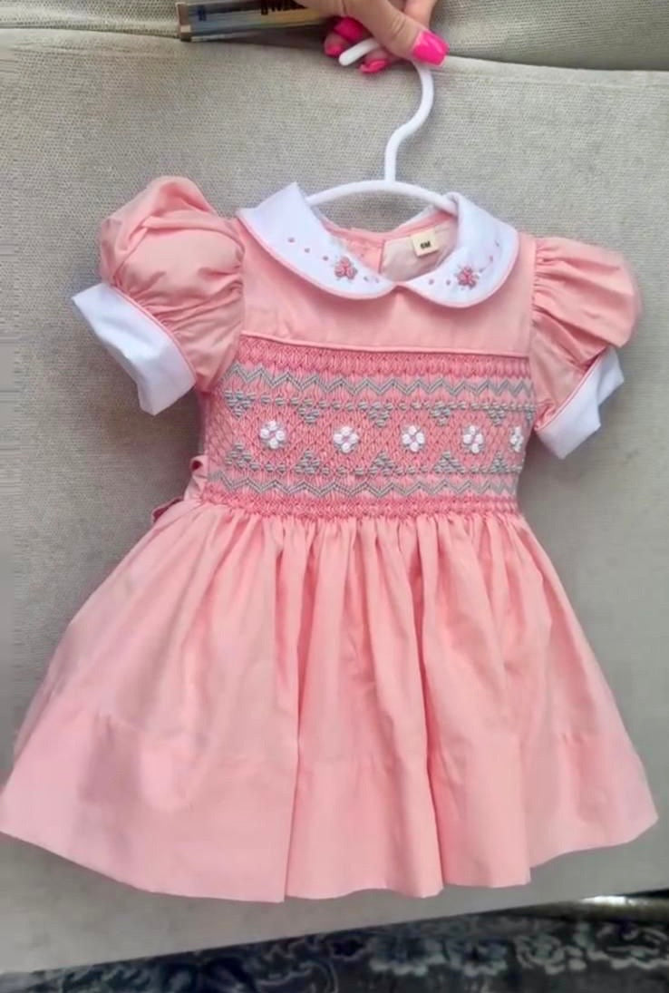 Peach coral smocked back and front with blue and white smocking