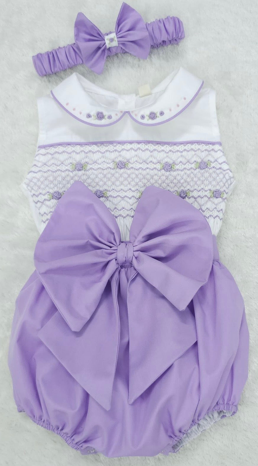 Lilac sleeveless smocked romper