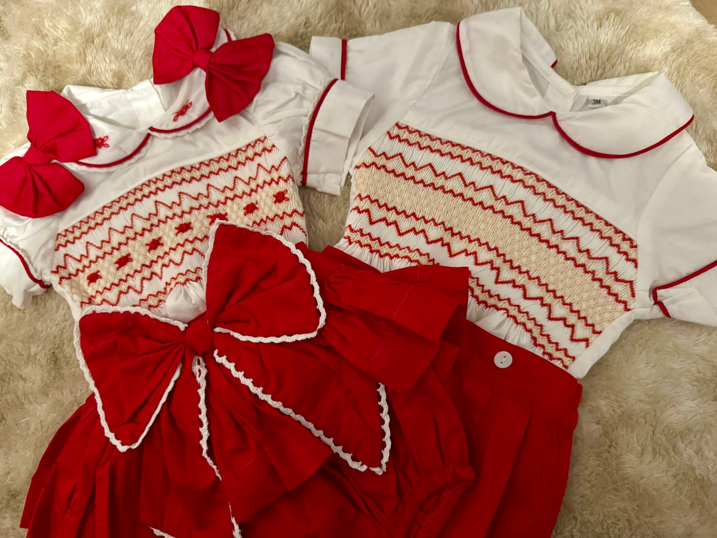 Red smocked skirt romper