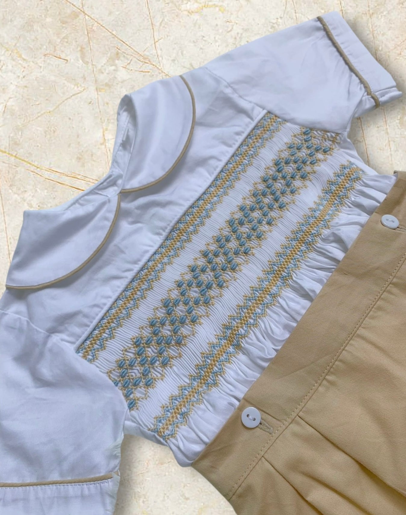 Tan with pastel blue smocking boys suit