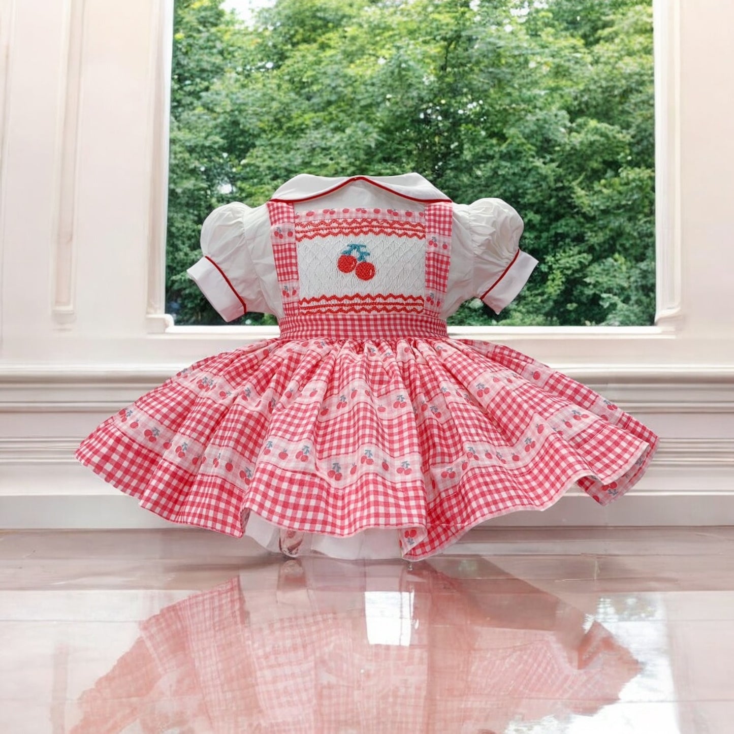 Cherry smocked pinafore dress