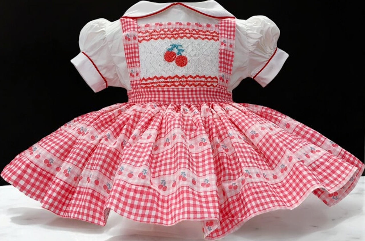 Cherry smocked pinafore dress