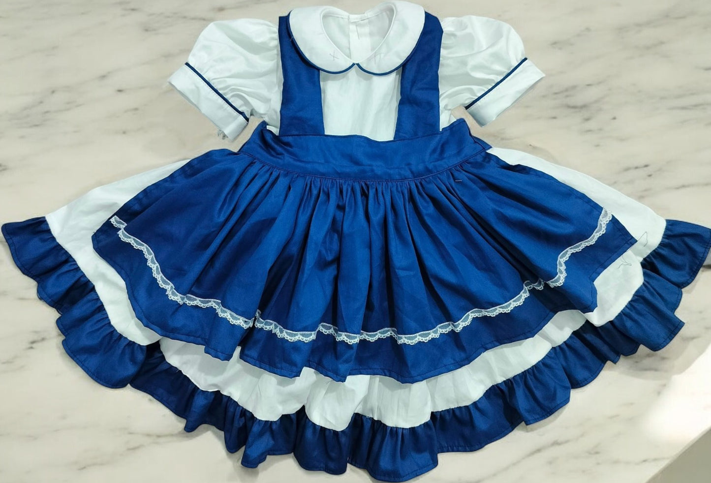 Classic white and blue dress with blue apron