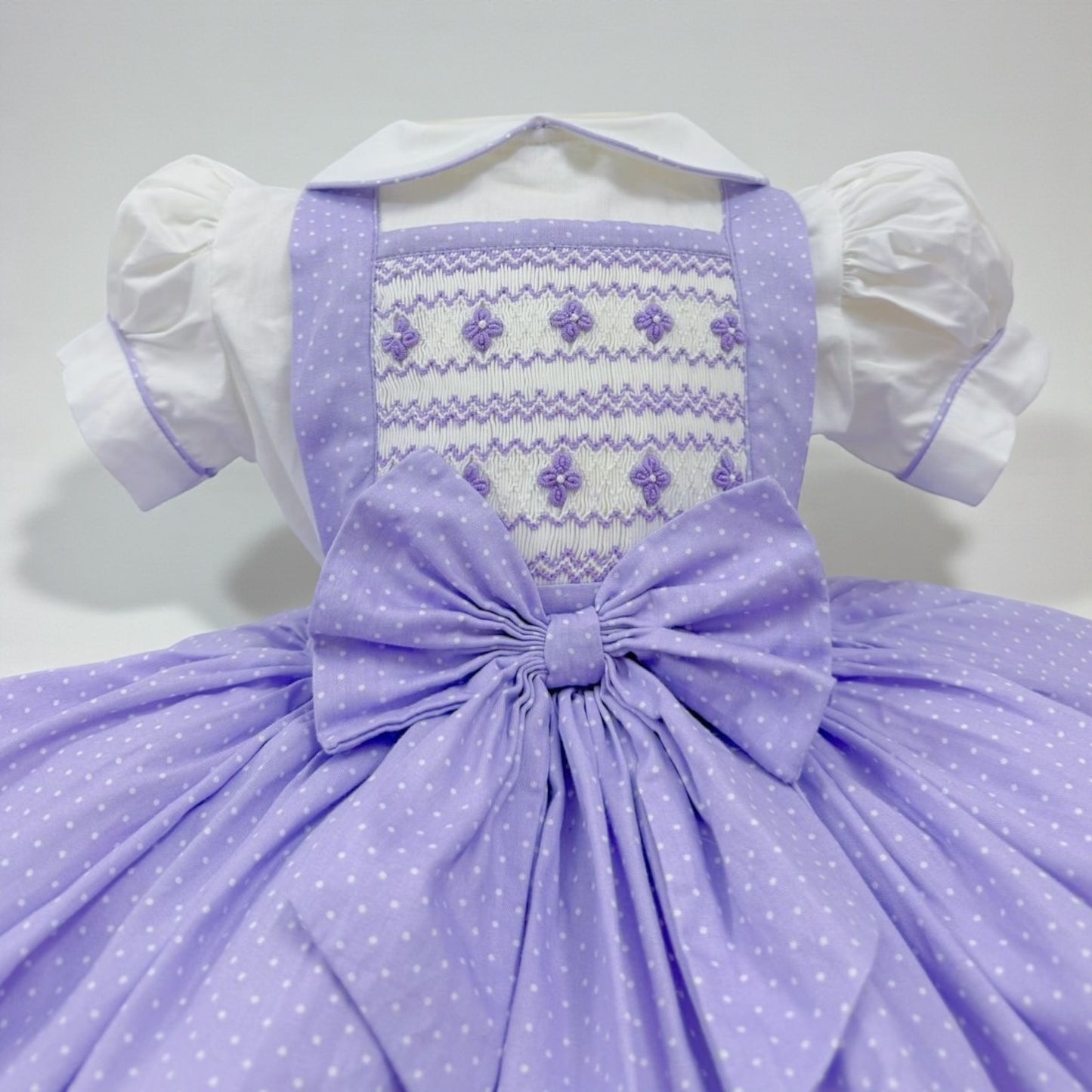 Lilac polkadot smocked pinafore dress