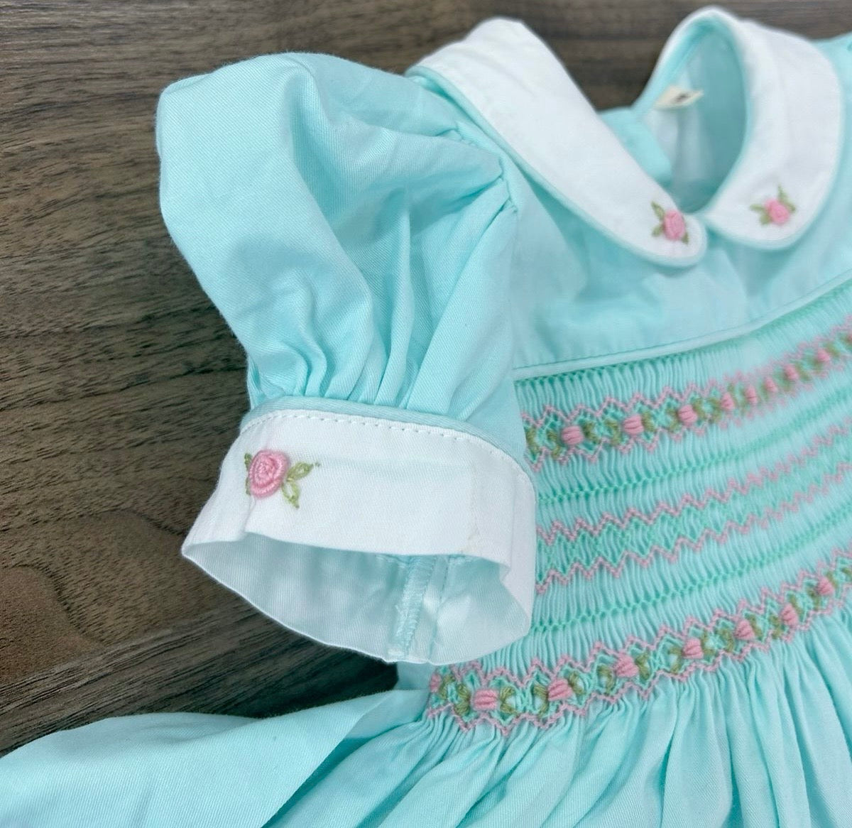 Mint smocked dress with pink embroidery