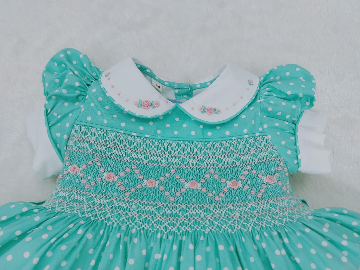 Turquoise polkadot smocked dress