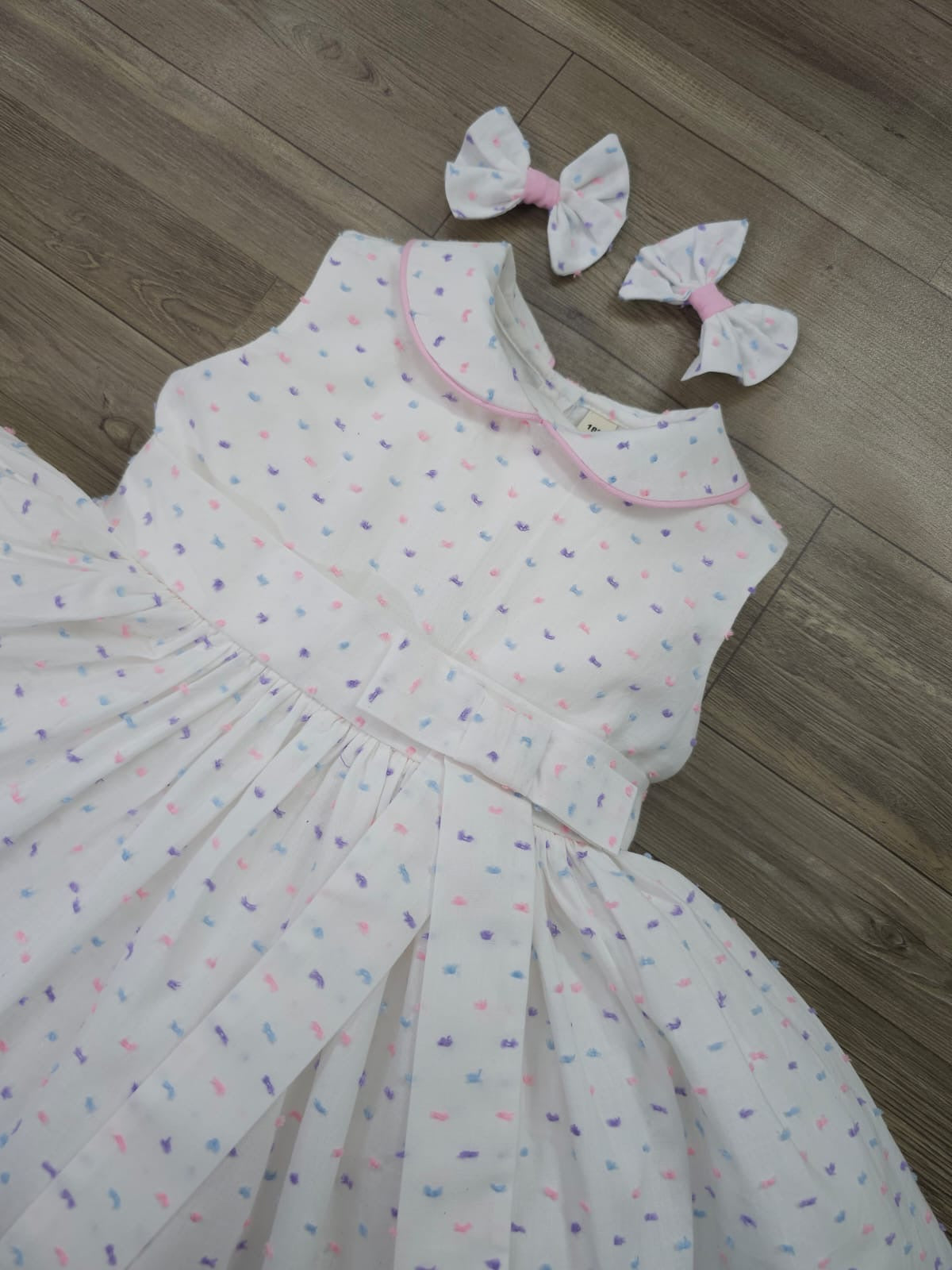Sleeveless classic Swiss dot dress
