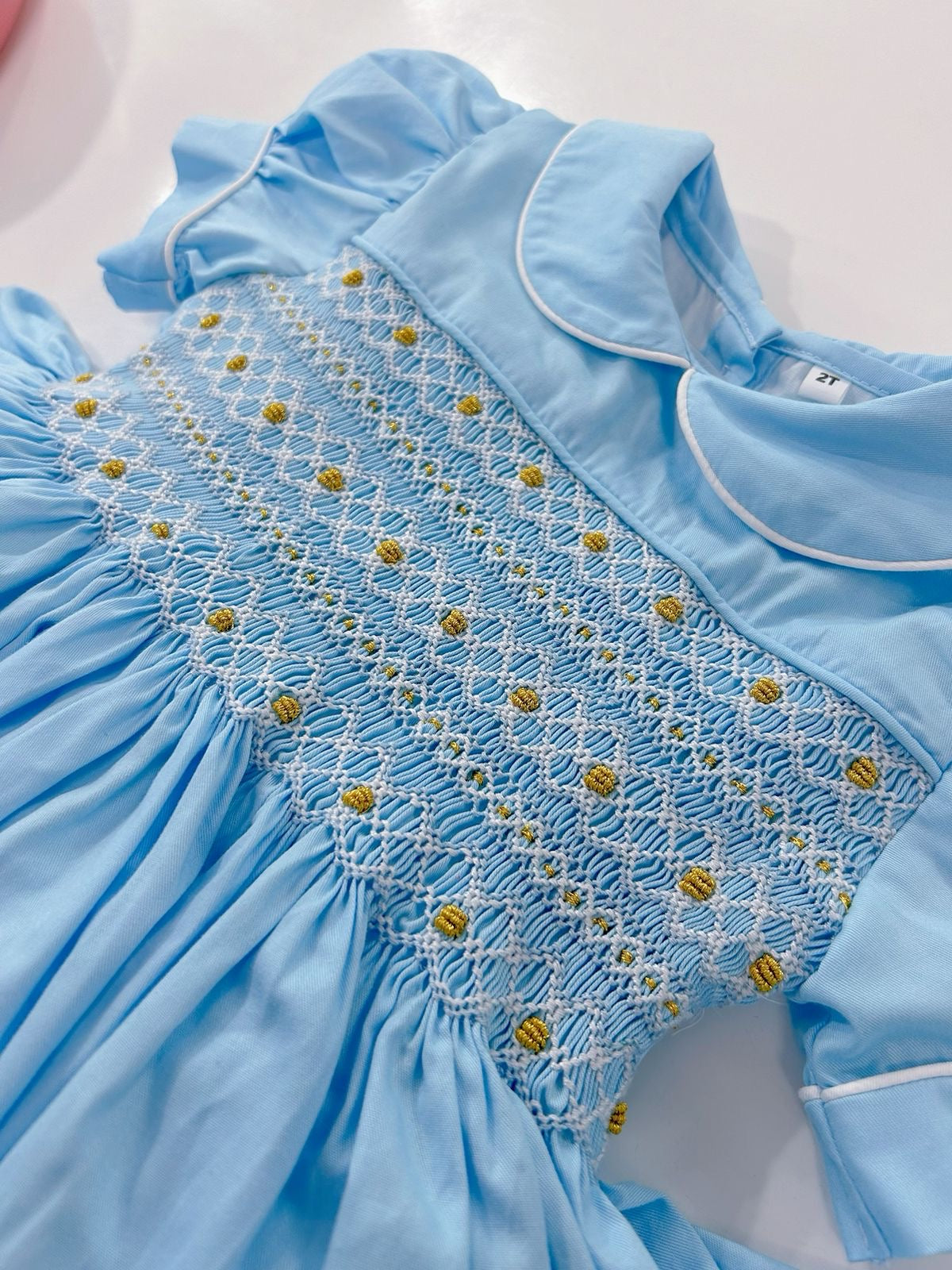 Baby blue with gold smocking dress