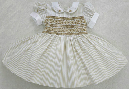 Gold and white striped dress with tan smocking ( got matching boys suit available )