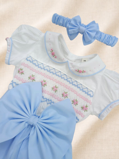 Baby blue hand smocked girls romper