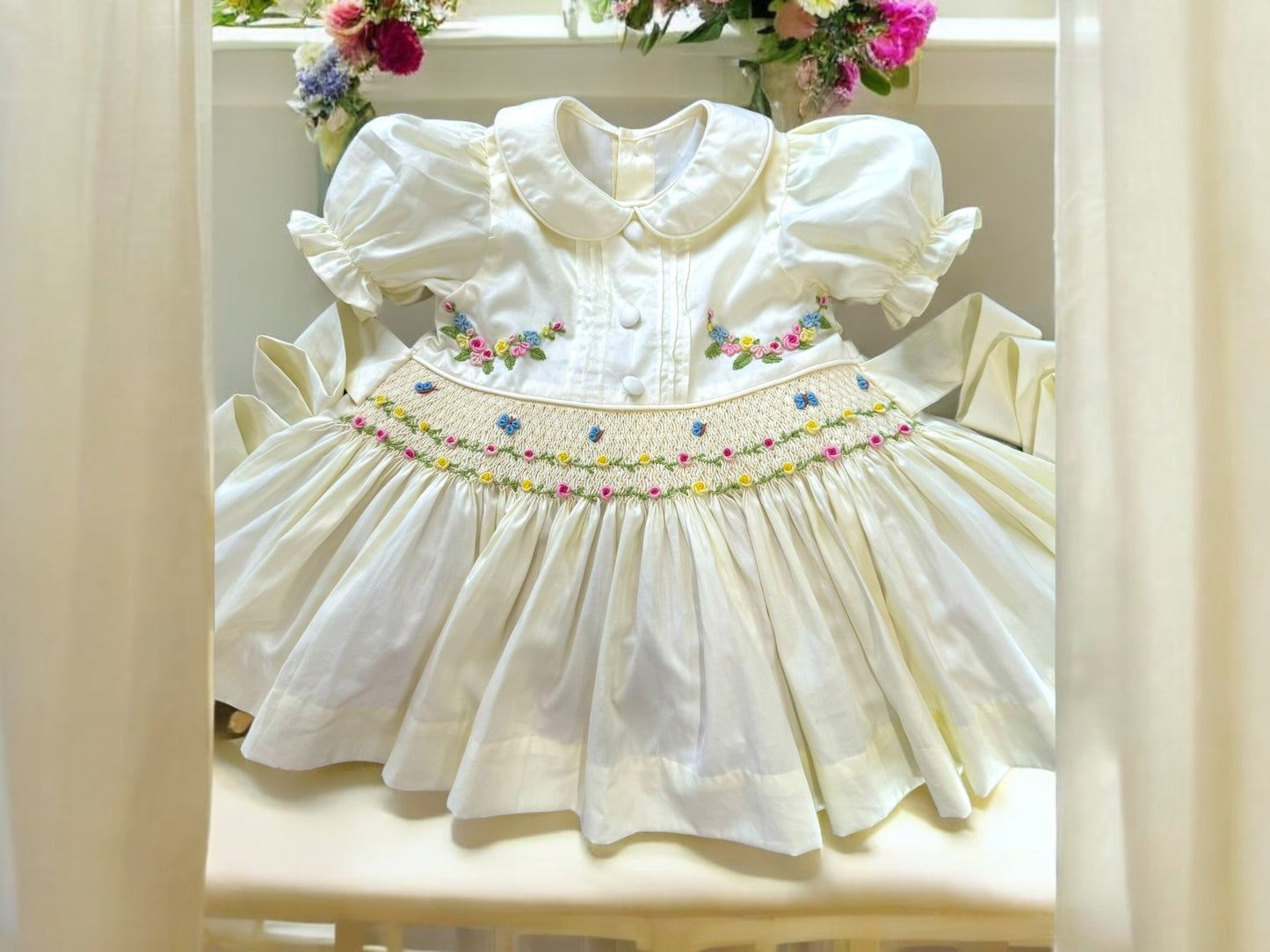 Cream with floral & butterfly smocked waist band