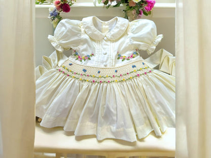Cream with floral & butterfly smocked waist band