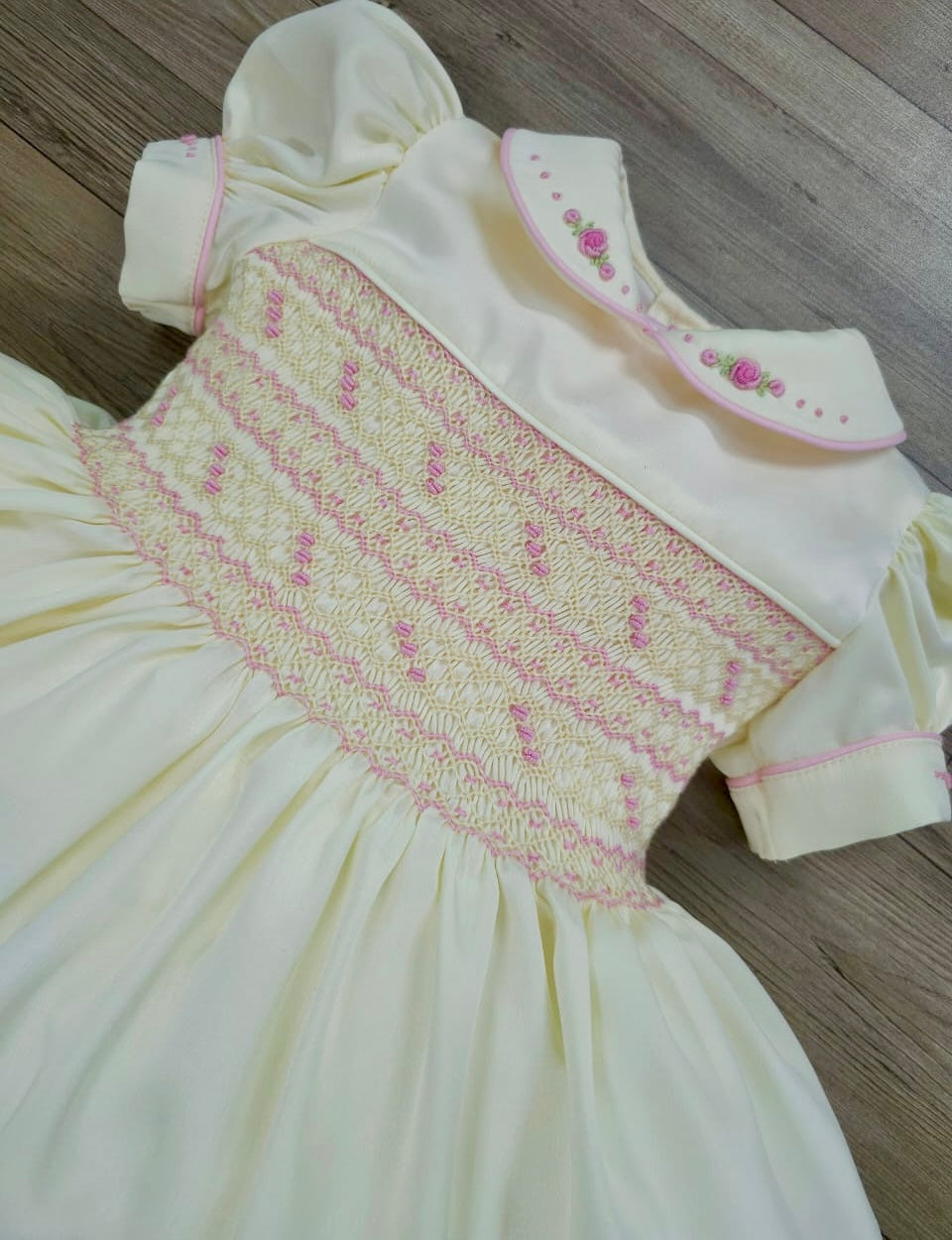 Butter cream and pink smocked dress