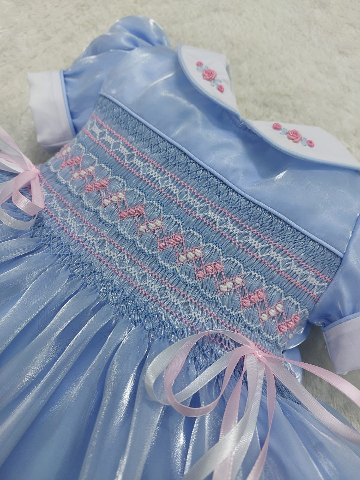 Blue silk with pink & white smocking and ribbon