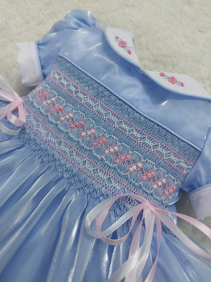 Blue silk with pink & white smocking and ribbon