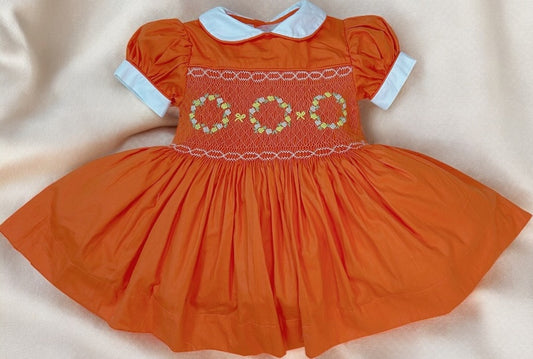 Orange smocked dress